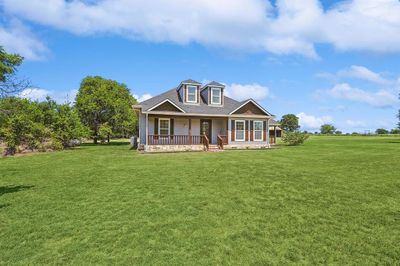 View of front of home with a porch and a front lawn | Image 3