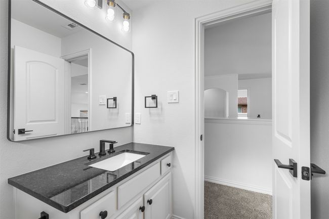 Bathroom featuring visible vents and vanity | Image 33