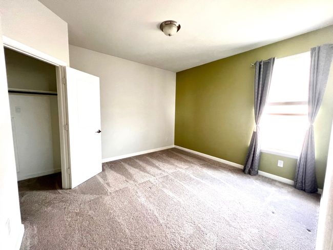 Unfurnished bedroom with carpet and baseboards | Image 20