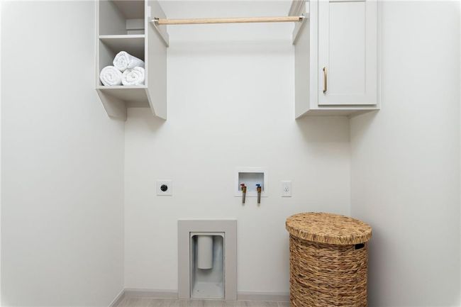 NOT ACTUAL HOME: Laundry room | Image 29