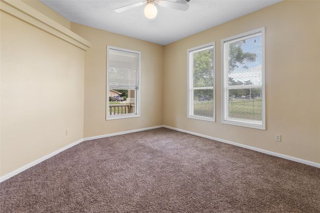 Bedroom with ceiling fan | Image 14