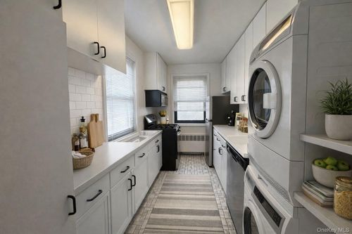 f13-lower-242-05 61 Avenue, New York, NY, 11362 | Card Image