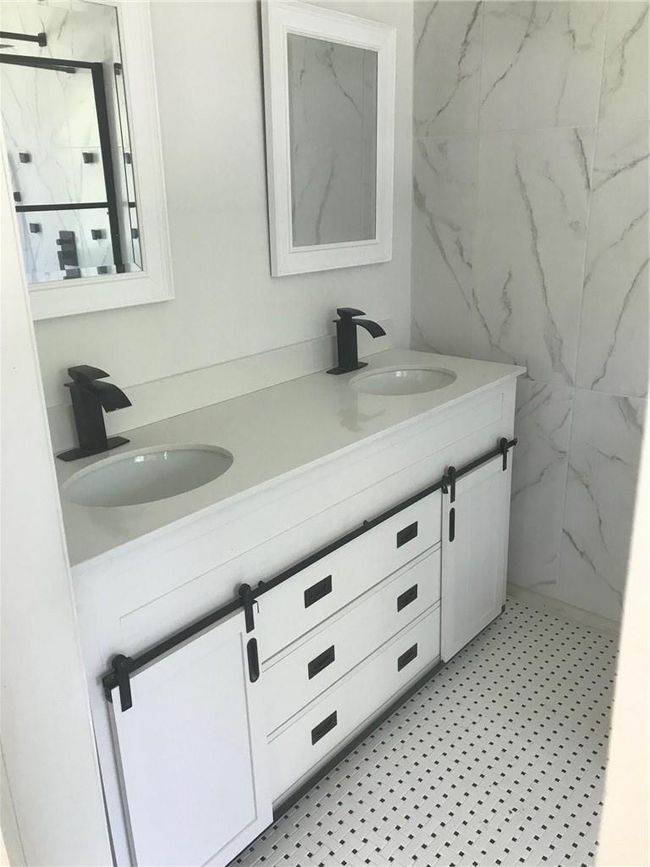 Bathroom featuring vanity | Image 22
