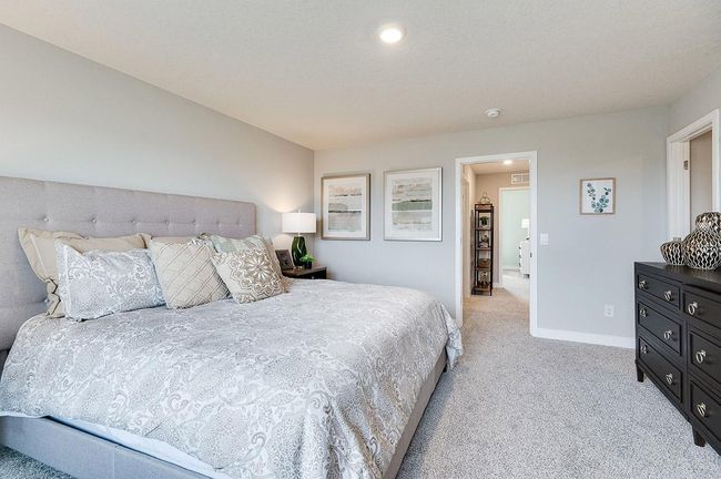 Two of three secondary bedrooms upstairs with plenty of natural light in each. *Pictures are of a model home, actual colors and finishes may vary. | Image 26