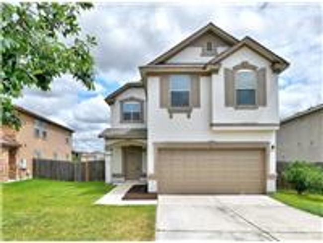 View of front of property with concrete driveway and a garage | Image 36
