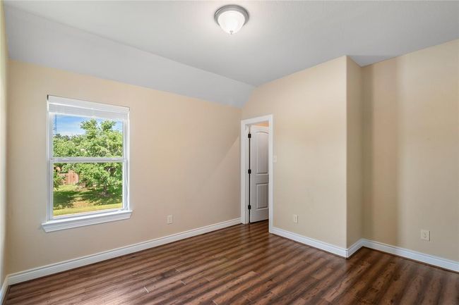 Another of the well-proportioned secondary bedrooms. | Image 31