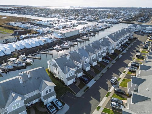 54-54 Ocean Watch Ct, Freeport, NY, 11520-5742 | Card Image