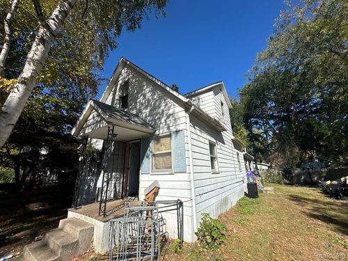 1924 Wood St, Saginaw, MI, 48602-1189 | Card Image