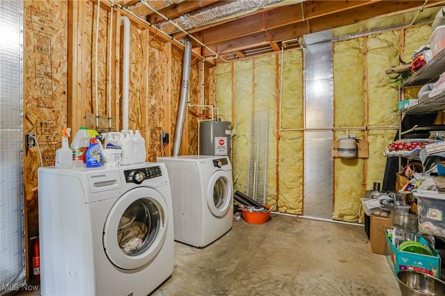 Laundry area with independent washer and dryer | Image 42