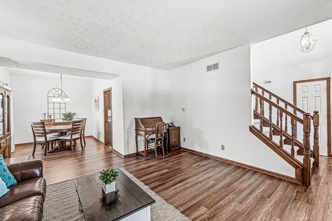 Main Floor Living room looking towards dining room | Image 6