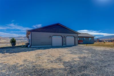 Garage featuring a mountain view | Image 3