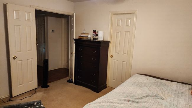 Bedroom with light carpet | Image 12