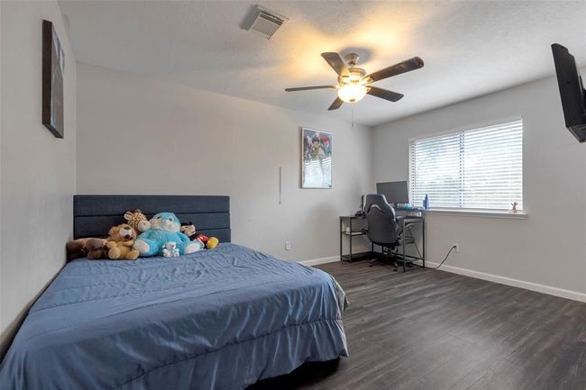 1003 Highland Woods Dr, House other with 4 bedrooms, 3 bathrooms and 2 parking in Highlands TX | Image 25