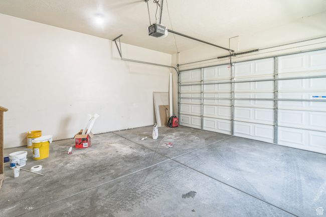 Garage featuring a garage door opener | Image 22
