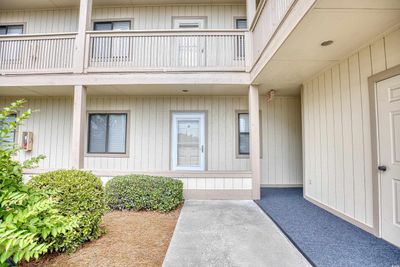 Property entrance featuring a balcony | Image 2