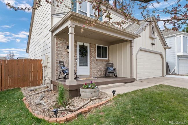 Front porch relaxing is calling your name! Enjoy your covered patio! | Image 19