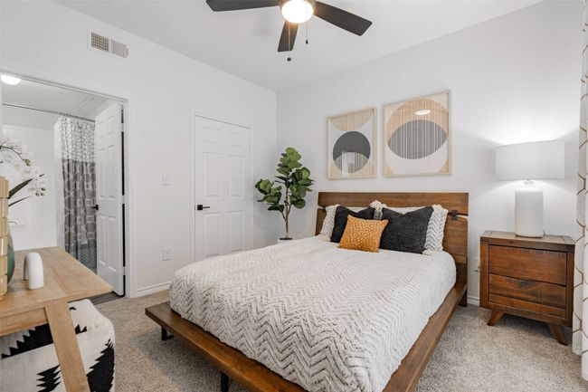 Carpeted bedroom featuring ceiling fan | Image 4