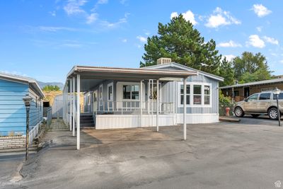 Manufactured / mobile home featuring covered porch | Image 2