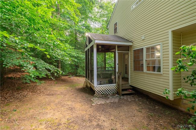 View of yard with a sunroom | Image 22