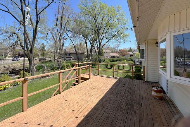 Deck is right off the kitchen with stairs to the g | Image 11