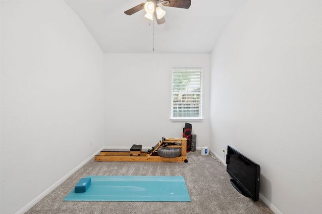 featuring carpet flooring, lofted ceiling, and a ceiling fan | Image 28