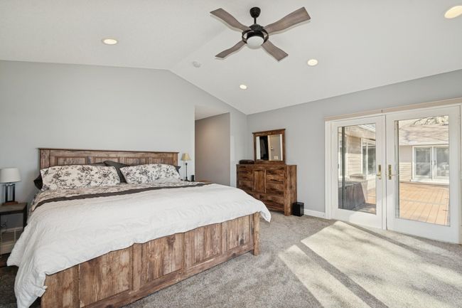 Primary bedroom suite walks out to maintenance free deck! | Image 26