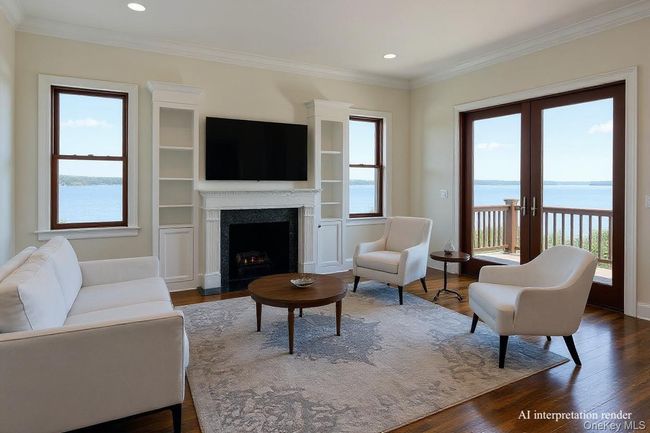 Living area featuring wood finished floors, ornamental molding, a premium fireplace, recessed lighting, and french doors | Image 16