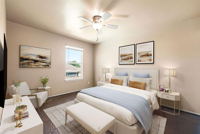 Versatile secondary bedroom with a neutral color palette and ample space for personalized design and furniture. *Virtually Staged | Image 18