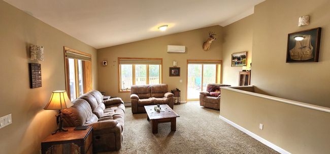 So much natural light in the living room and walk out to the deck. | Image 6