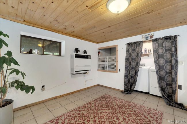 Laundry in the finished basement | Image 23