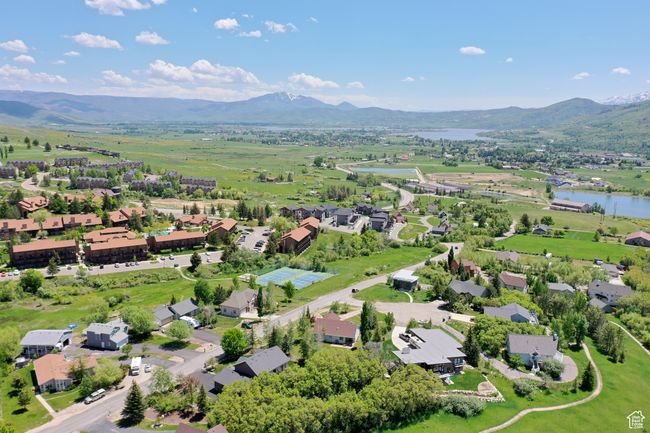 Drone / aerial view featuring a water and mountain view | Image 40