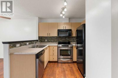 760 Railway Gate Sw, Townhouse with 3 bedrooms, 3 bathrooms and 2 parking in Airdrie AB | Image 2