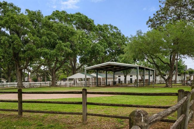 The Equestrian Center still has some of the original white wood clad stables, offices, and barn in use today. A real gem if your family has an interest in riding or learning to ride. | Image 46