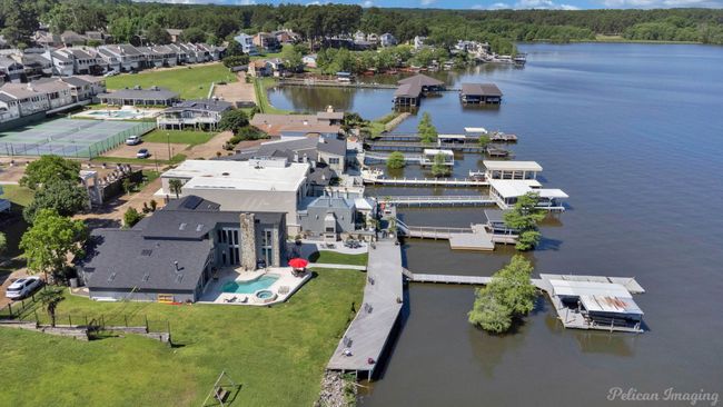 Bird's eye view with a water view, a residential view, and a view of trees | Image 34