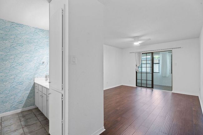 The ensuite bathroom also provides convenient built-in linen storage. | Image 21
