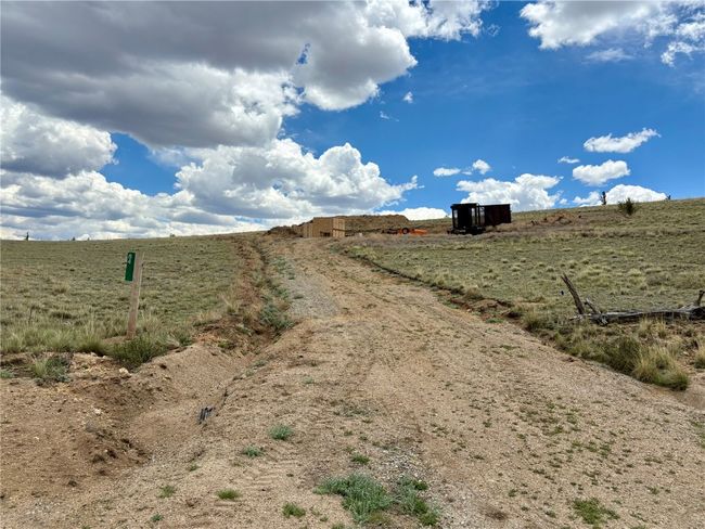 View of dirt / gravel road featuring a view of countryside | Image 16