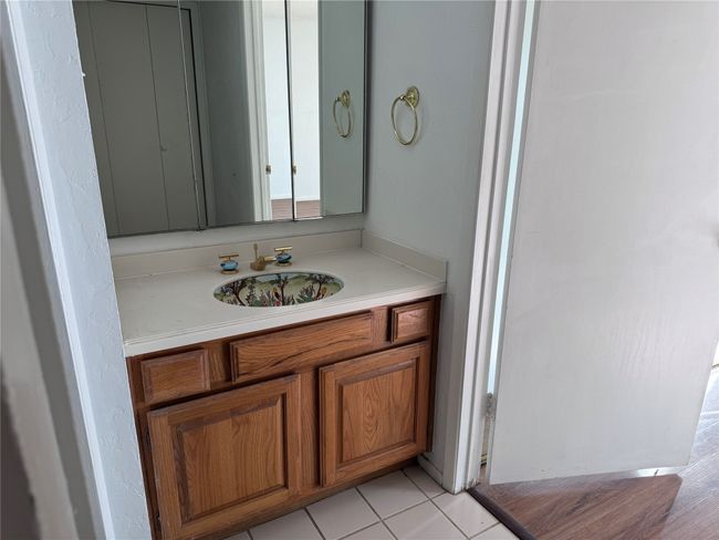 Bathroom featuring vanity | Image 6