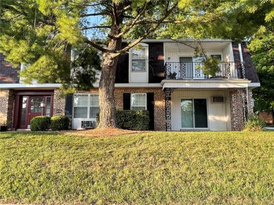 Corner Ground Unit with Covered Patio! | Image 1