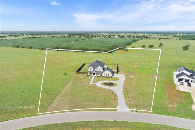 Aerial view of sparsely populated area featuring property boundaries highlighted and agricultural land | Image 40