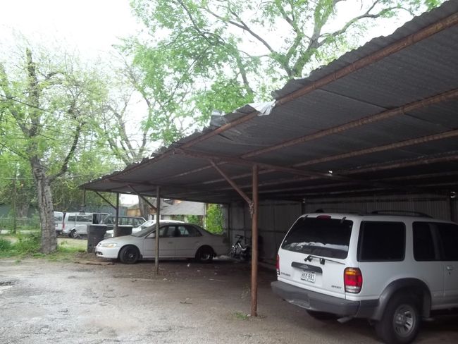 Covered parking in the back. | Image 7