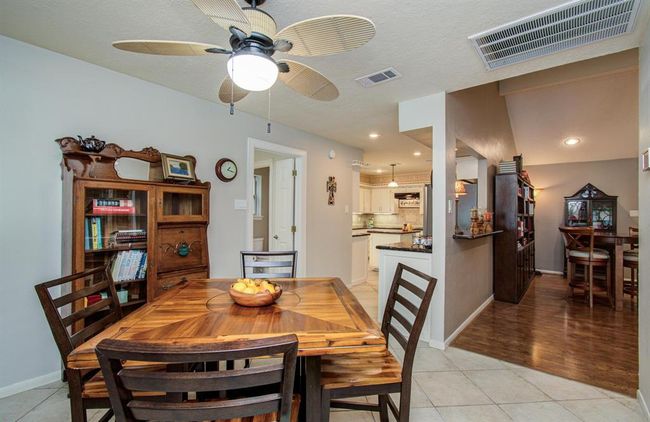 Notice the convenient serving bar from kitchen to family room. | Image 16