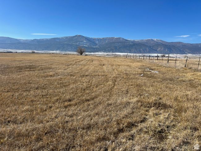 View of mountain background featuring rural landscape | Image 6