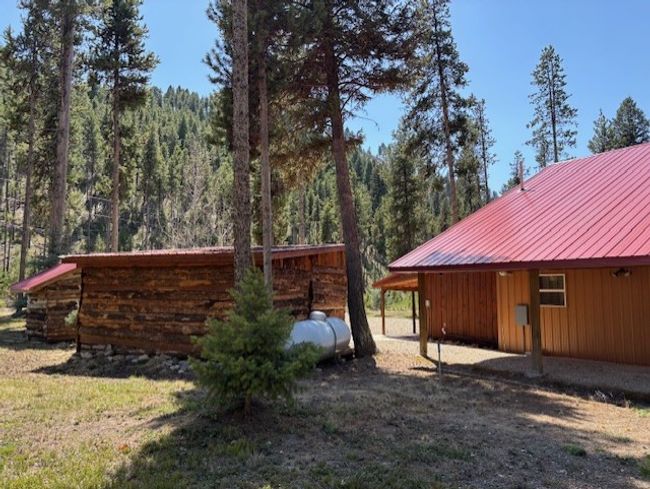 View of outdoor structure with a wooded view | Image 30