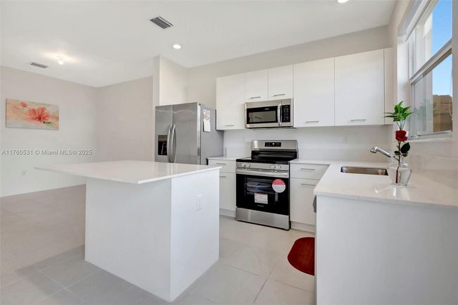 2455 Nw 119 Th Ter, Home with 3 bedrooms, 3 bathrooms and null parking in Miami FL | Image 6