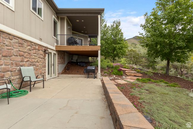 View of patio / terrace featuring a balcony and a grill | Image 39