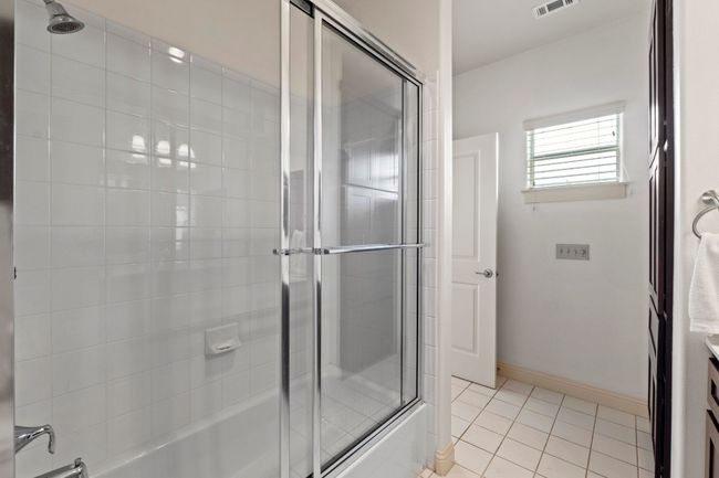 This walk-in shower completes the secondary en-suite bathroom. | Image 28