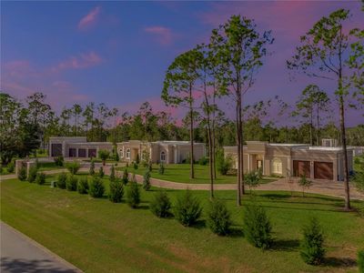 Main residence, 2nd residence and garage with RV garage | Image 1