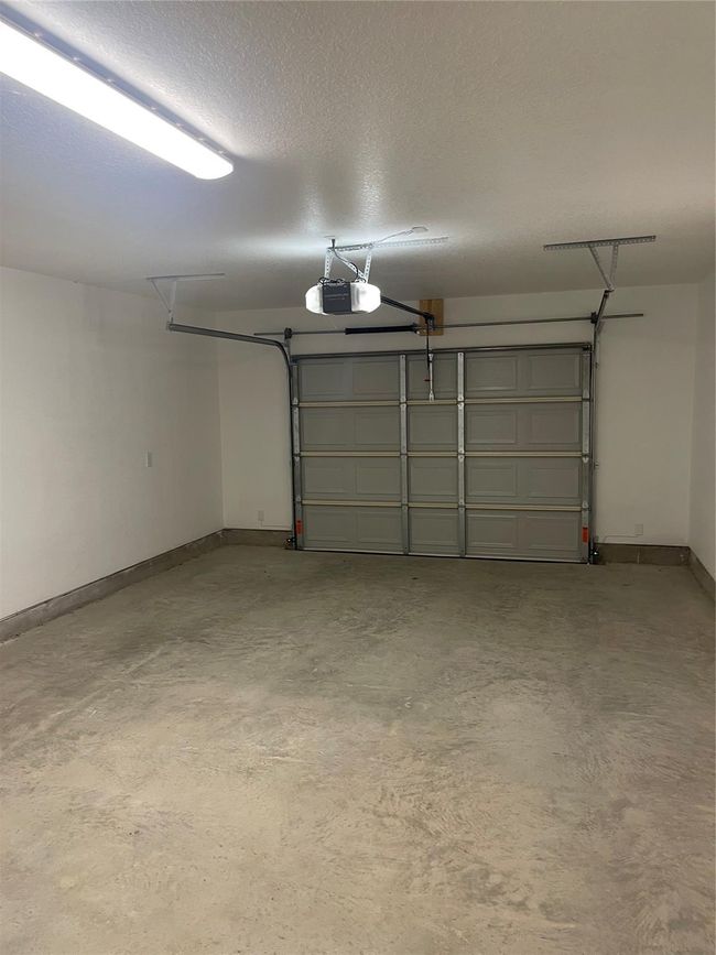 One care garage with garage door opener | Image 13
