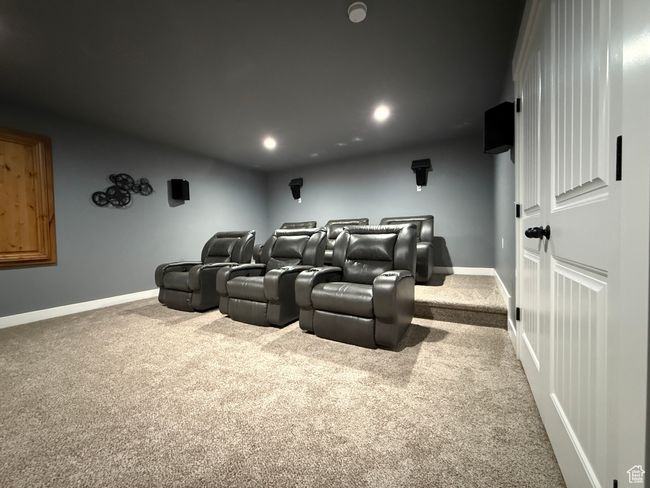 Carpeted home theater room featuring recessed lighting and baseboards | Image 47