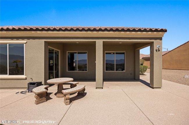 Back of house featuring a patio area and stucco siding | Image 57